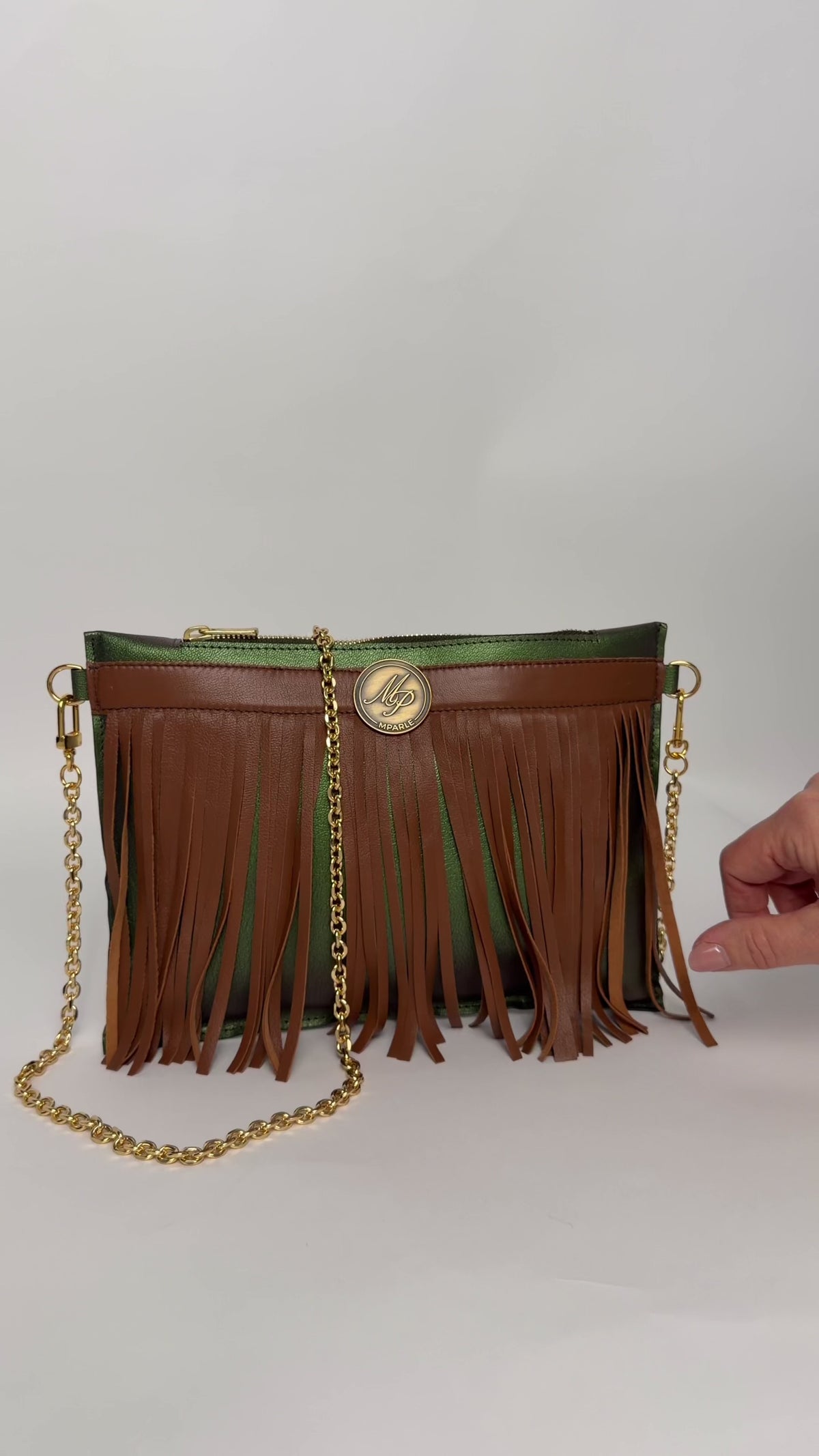 Clutch Fimbria groen in beweging